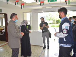 GR-12-Boys giving donation at Sharjah City for HumanitarianServices